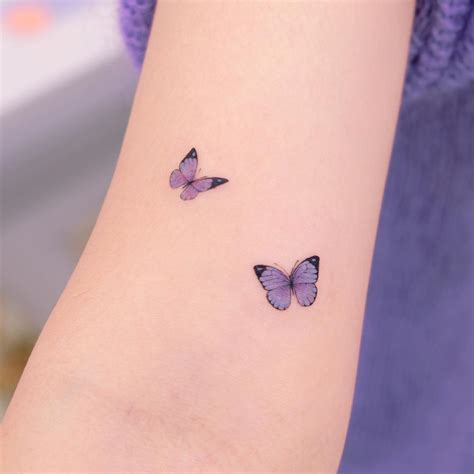 2 butterfly tattoos|cute butterfly tattoo designs.